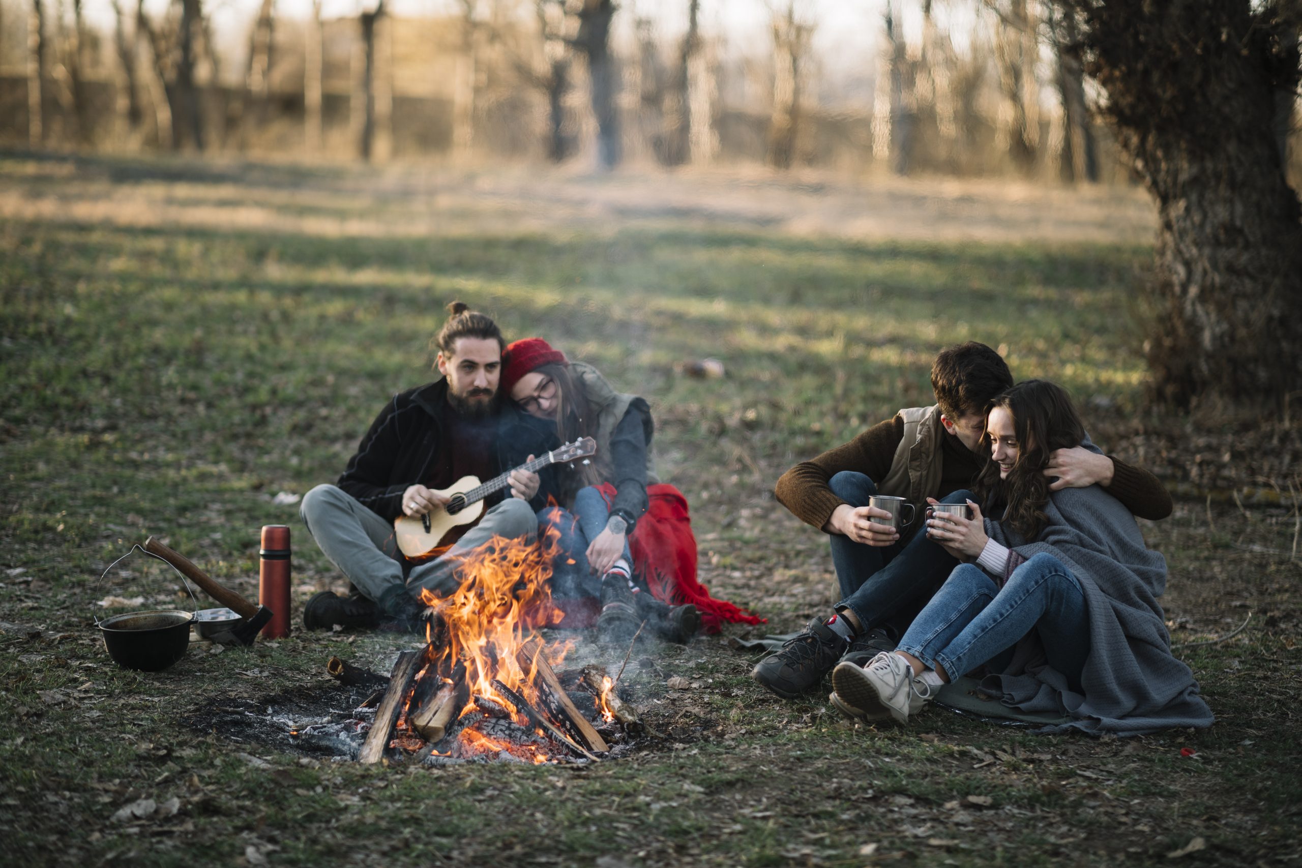 Couple near campfire